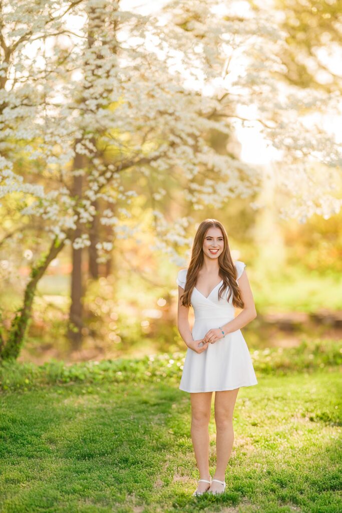 Check out Serena’s beautiful senior portraits in Apex, NC. From the golf course to the willow trees, see how this Apex High School senior styled her Altar'd State favorites for a fun, easy-going session with Aimee Sue Photography.
