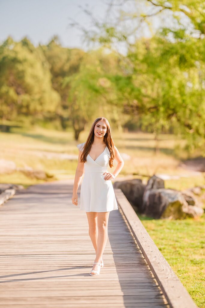 Check out Serena’s beautiful senior portraits in Apex, NC. From the golf course to the willow trees, see how this Apex High School senior styled her Altar'd State favorites for a fun, easy-going session with Aimee Sue Photography.