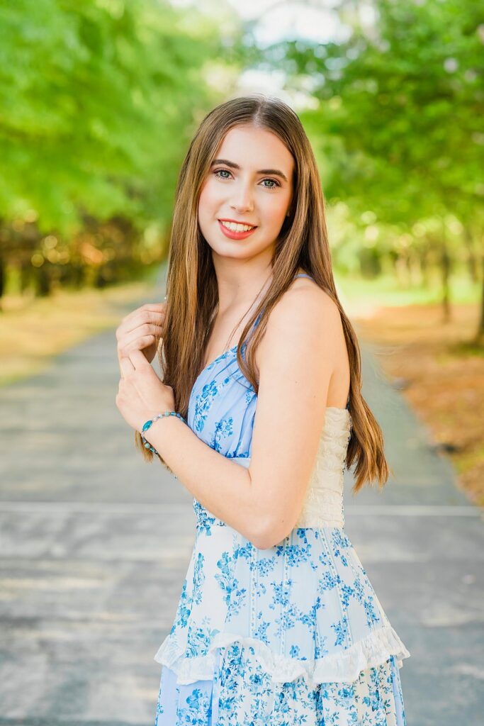 Check out Serena’s beautiful senior portraits in Apex, NC. From the golf course to the willow trees, see how this Apex High School senior styled her Altar'd State favorites for a fun, easy-going session with Aimee Sue Photography.